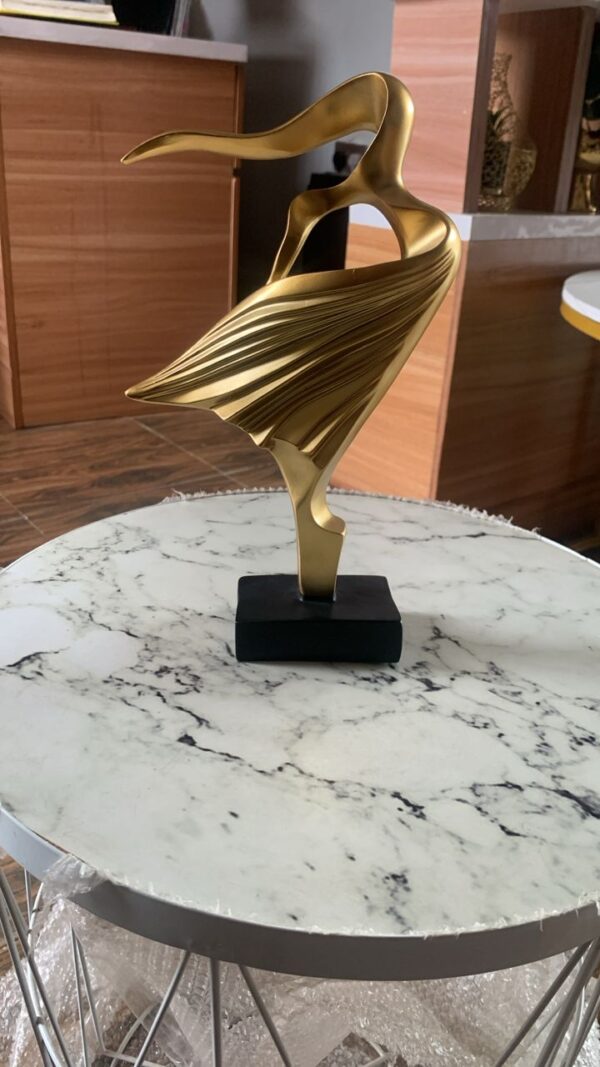 Dancing wave golden ornament
